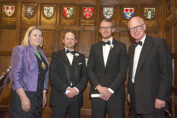 Prize winners accompanied by their tutors from the colleges receiving their awards from the Master, Dr Heather Barrett-Mold OBE, at the Autumn Court Dinner 2019
