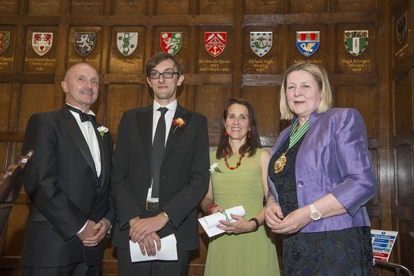 Prize winners accompanied by their tutors from the colleges receiving their awards from the Master, Dr Heather Barrett-Mold OBE, at the Autumn Court Dinner 2019